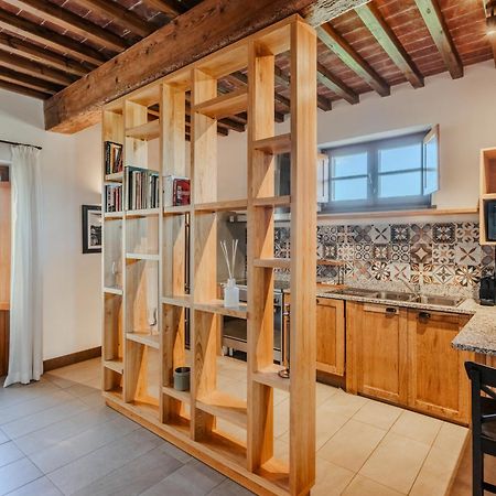 Villa Tolomei Hotel&Resort Firenze Esterno foto A room divider in a kitchen
