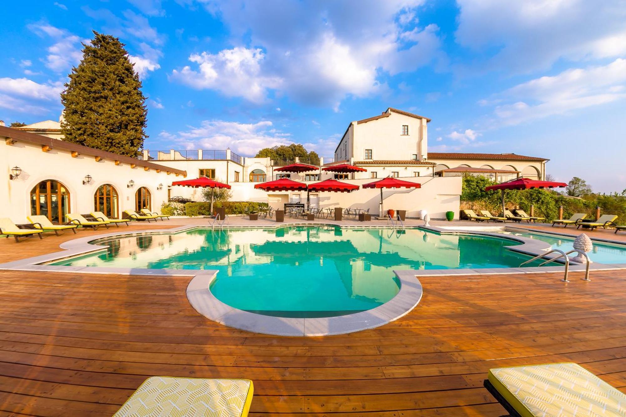 Villa Tolomei Hotel&Resort Firenze Esterno foto The swimming pool at the hotel