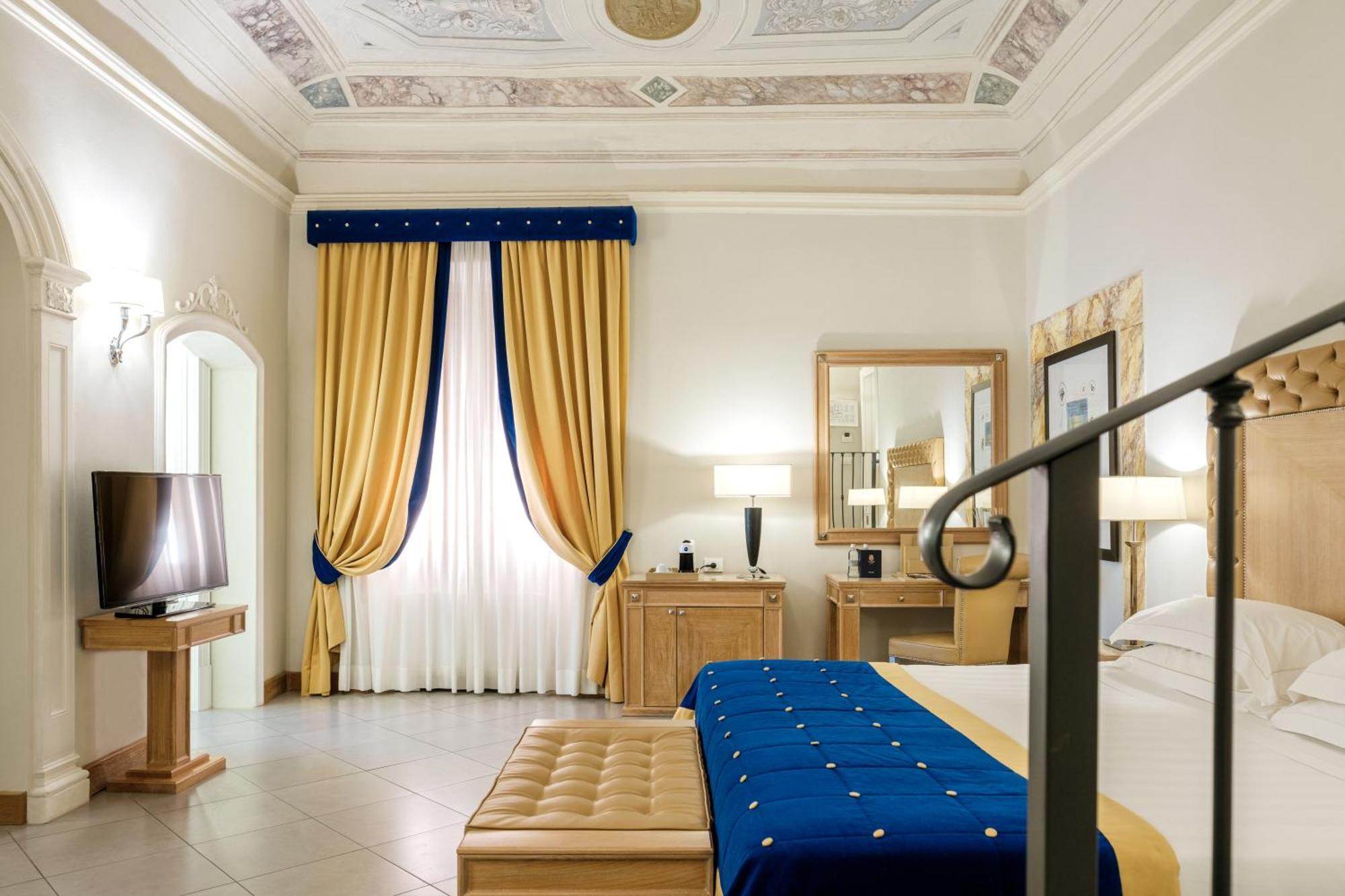 Villa Tolomei Hotel&Resort Firenze Esterno foto A room at the hotel