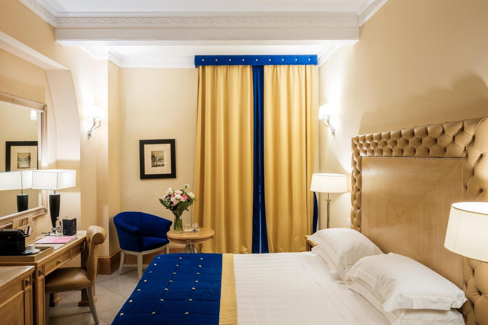 Villa Tolomei Hotel&Resort Firenze Esterno foto A room at the hotel