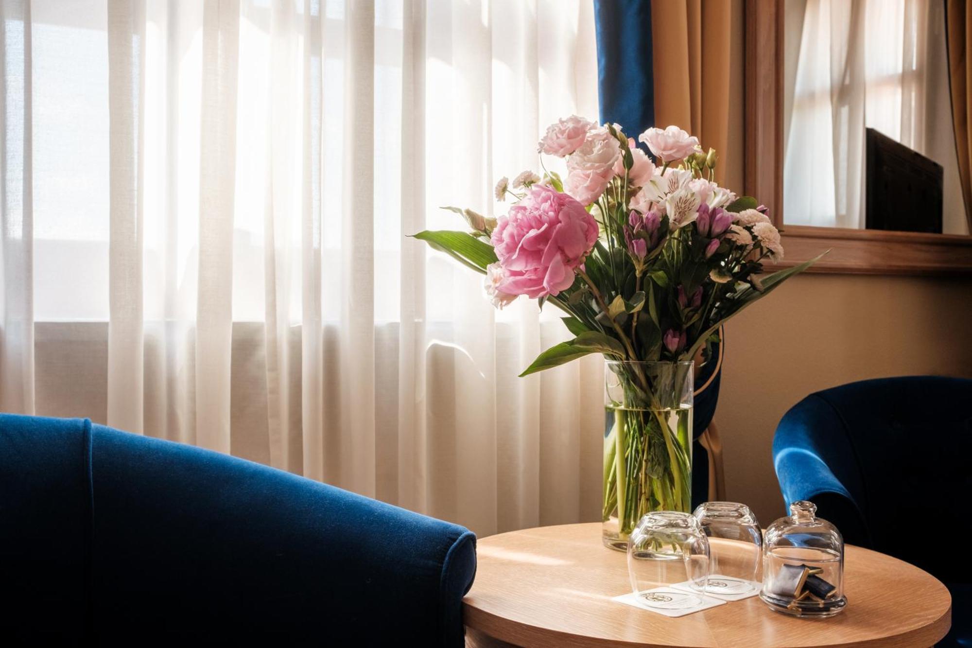 Villa Tolomei Hotel&Resort Firenze Esterno foto A bouquet of flowers