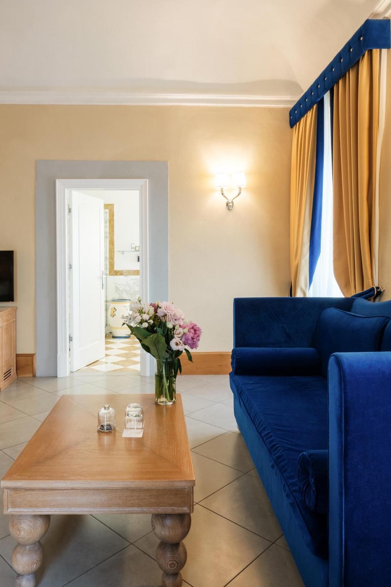 Villa Tolomei Hotel&Resort Firenze Esterno foto A suite at the hotel