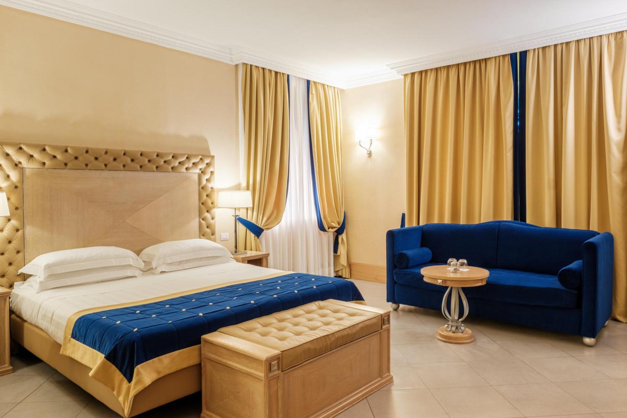 Villa Tolomei Hotel&Resort Firenze Esterno foto A room at the hotel