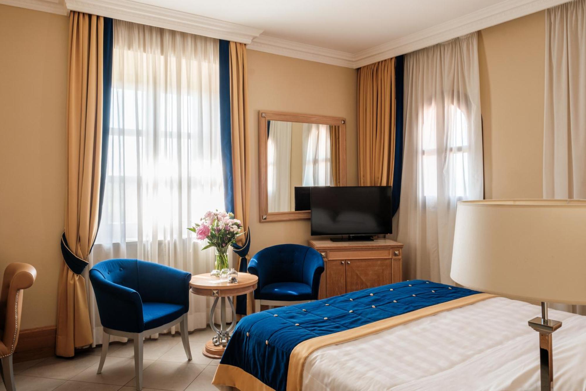 Villa Tolomei Hotel&Resort Firenze Esterno foto A room at the hotel