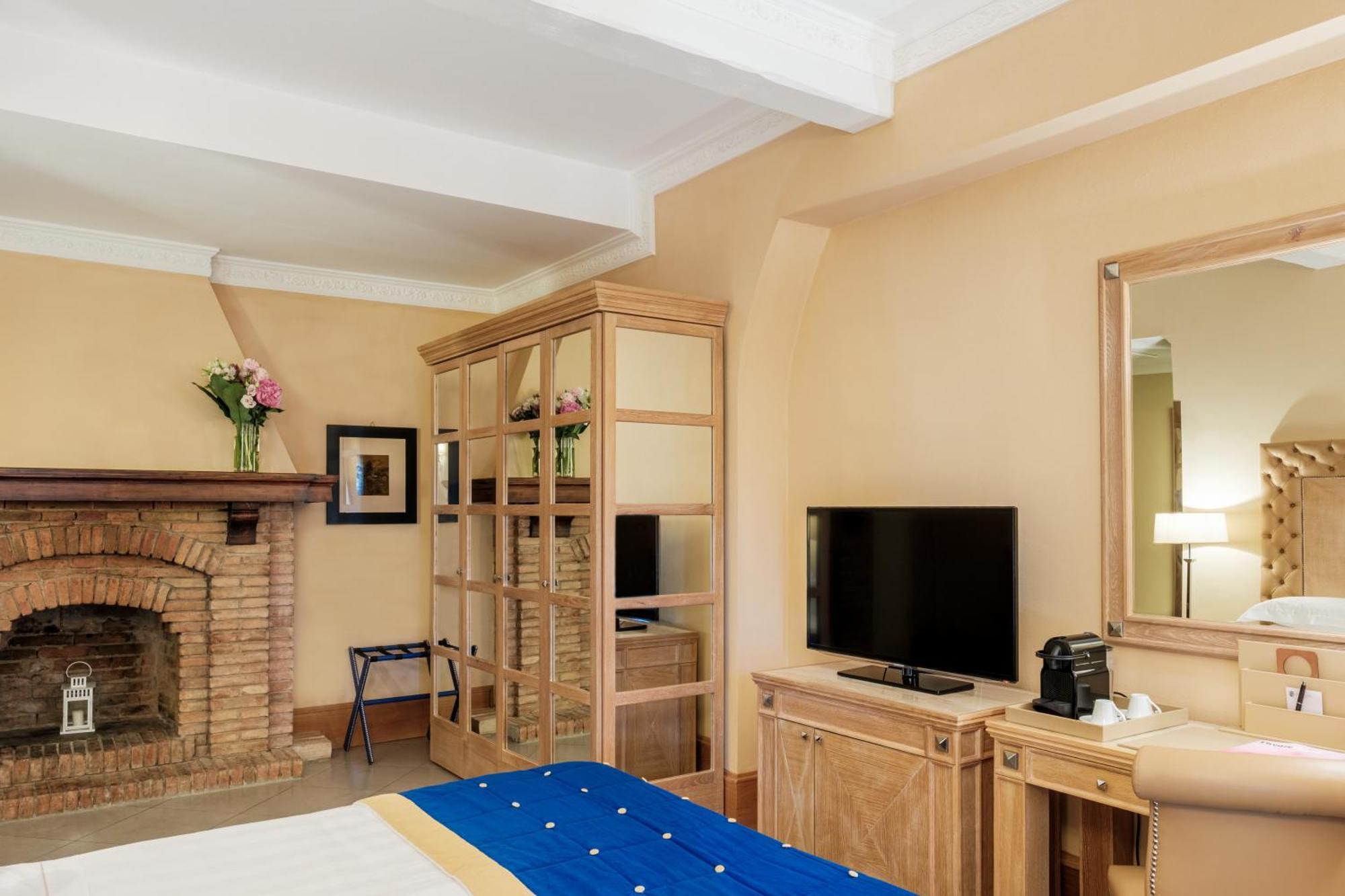 Villa Tolomei Hotel&Resort Firenze Esterno foto A bedroom at the hotel