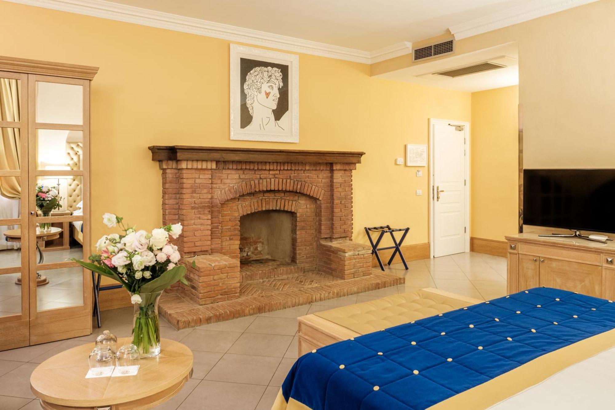 Villa Tolomei Hotel&Resort Firenze Esterno foto A room at the hotel