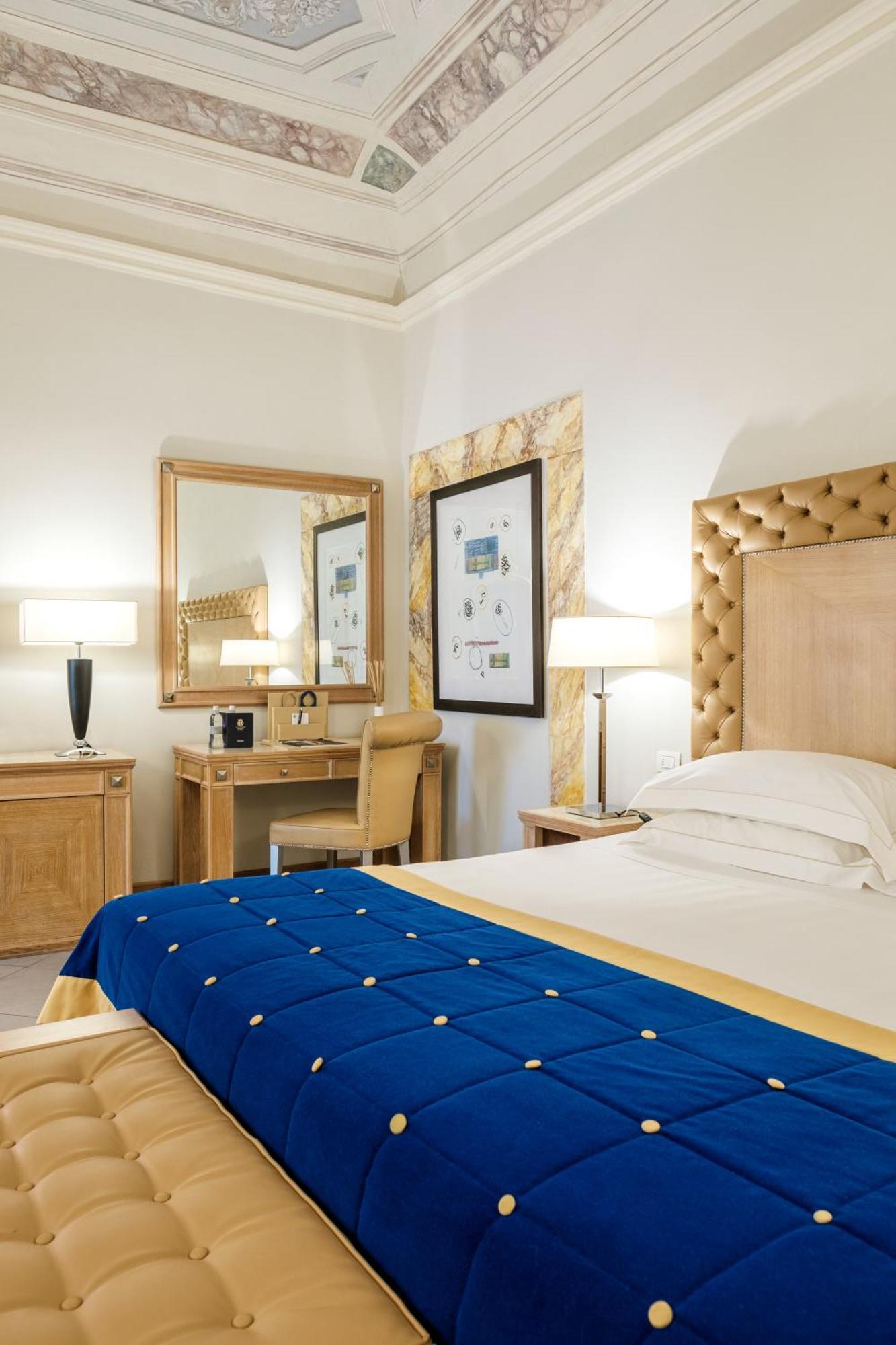Villa Tolomei Hotel&Resort Firenze Esterno foto A room at the hotel
