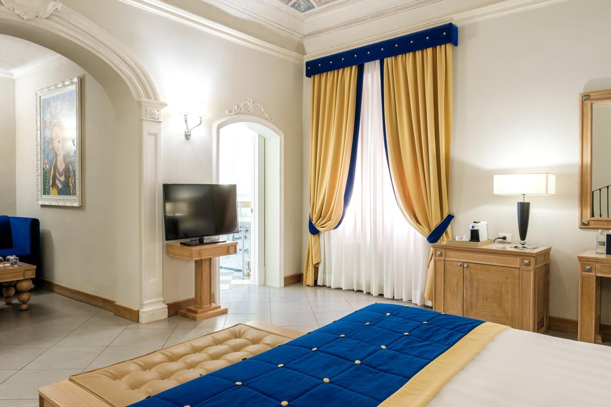 Villa Tolomei Hotel&Resort Firenze Esterno foto A bedroom at the hotel