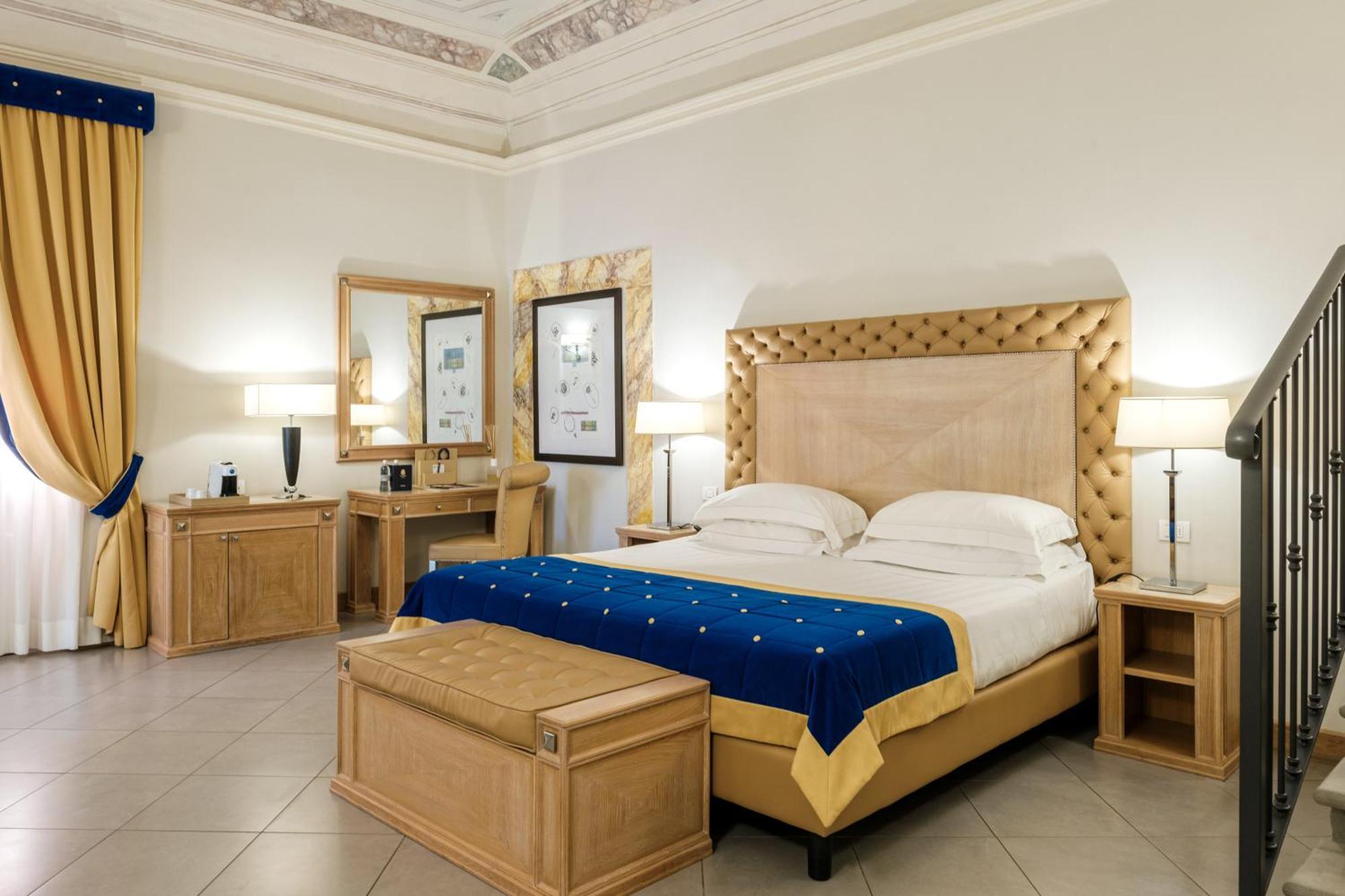 Villa Tolomei Hotel&Resort Firenze Esterno foto A bedroom at the hotel