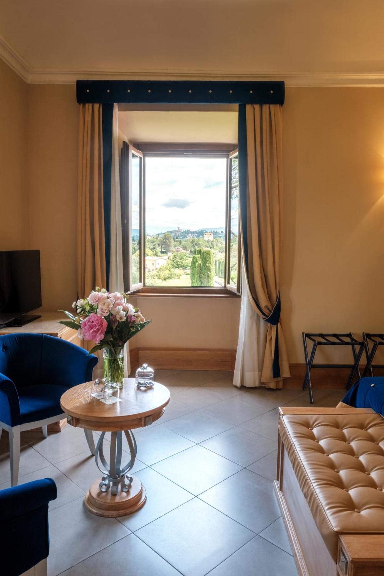 Villa Tolomei Hotel&Resort Firenze Esterno foto A room at the hotel