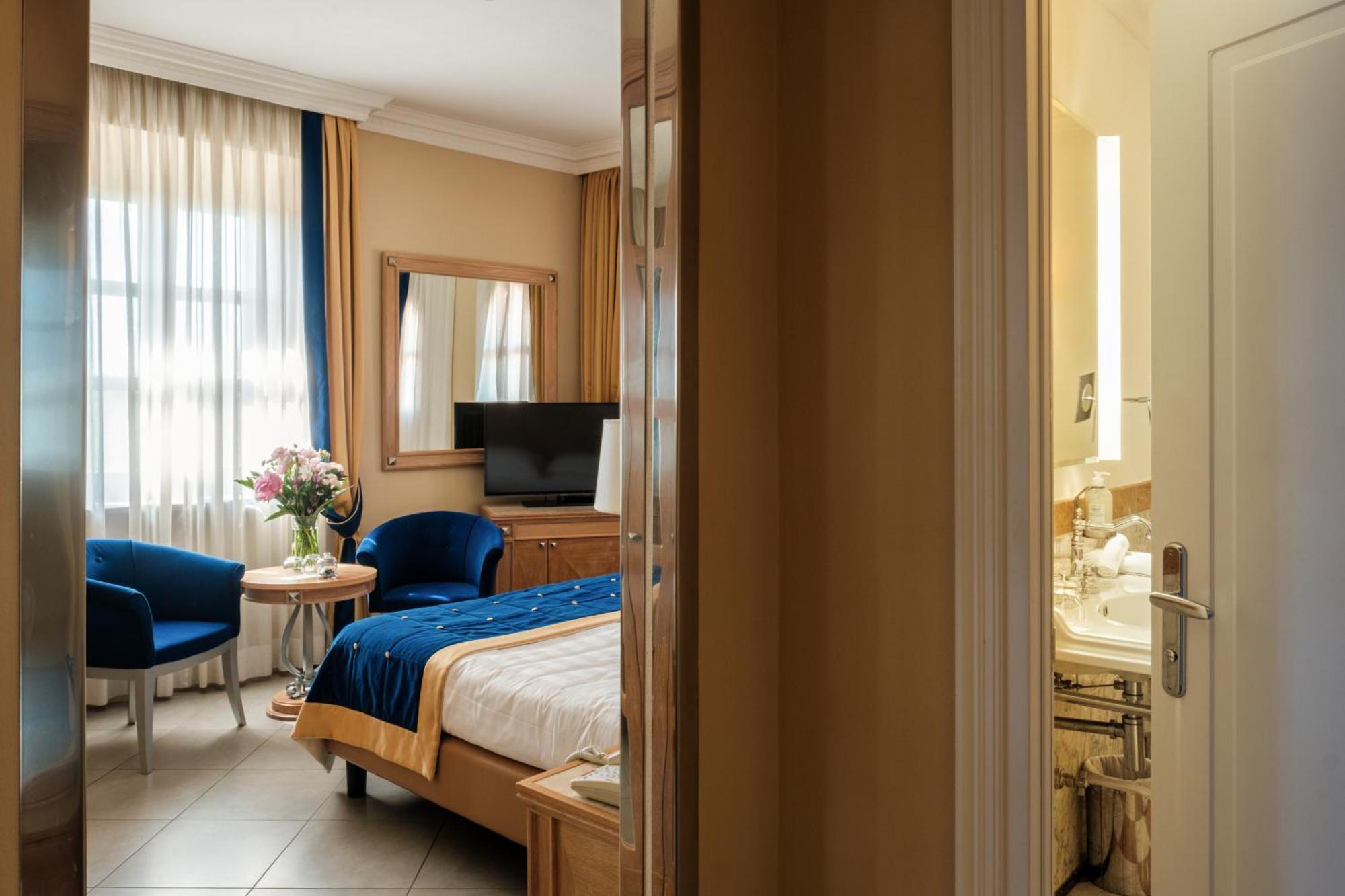 Villa Tolomei Hotel&Resort Firenze Esterno foto A room at the hotel