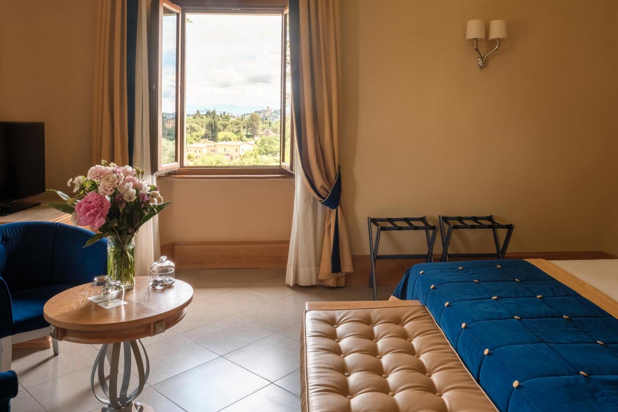 Villa Tolomei Hotel&Resort Firenze Esterno foto A room at the hotel