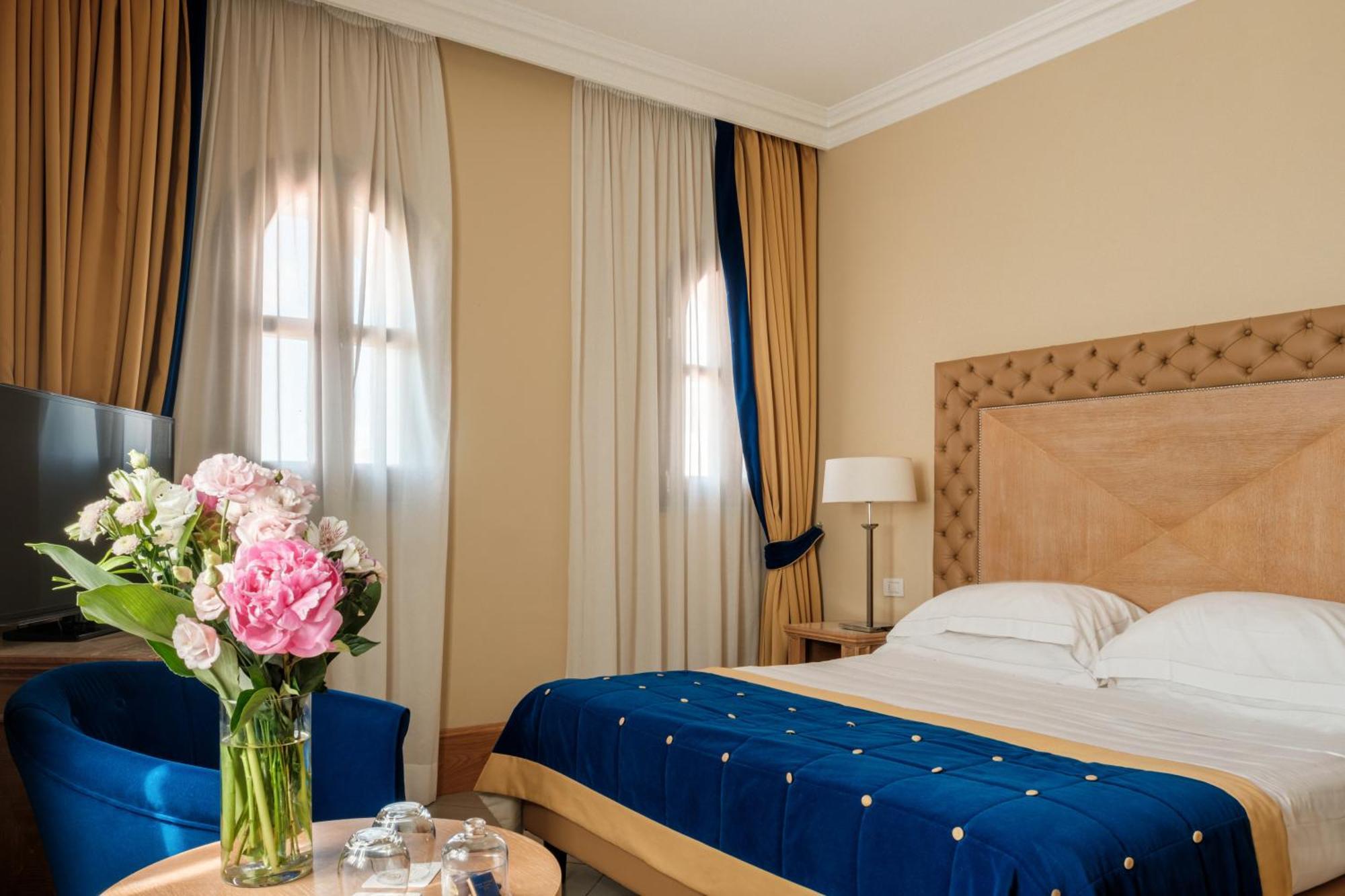 Villa Tolomei Hotel&Resort Firenze Esterno foto A room at the hotel