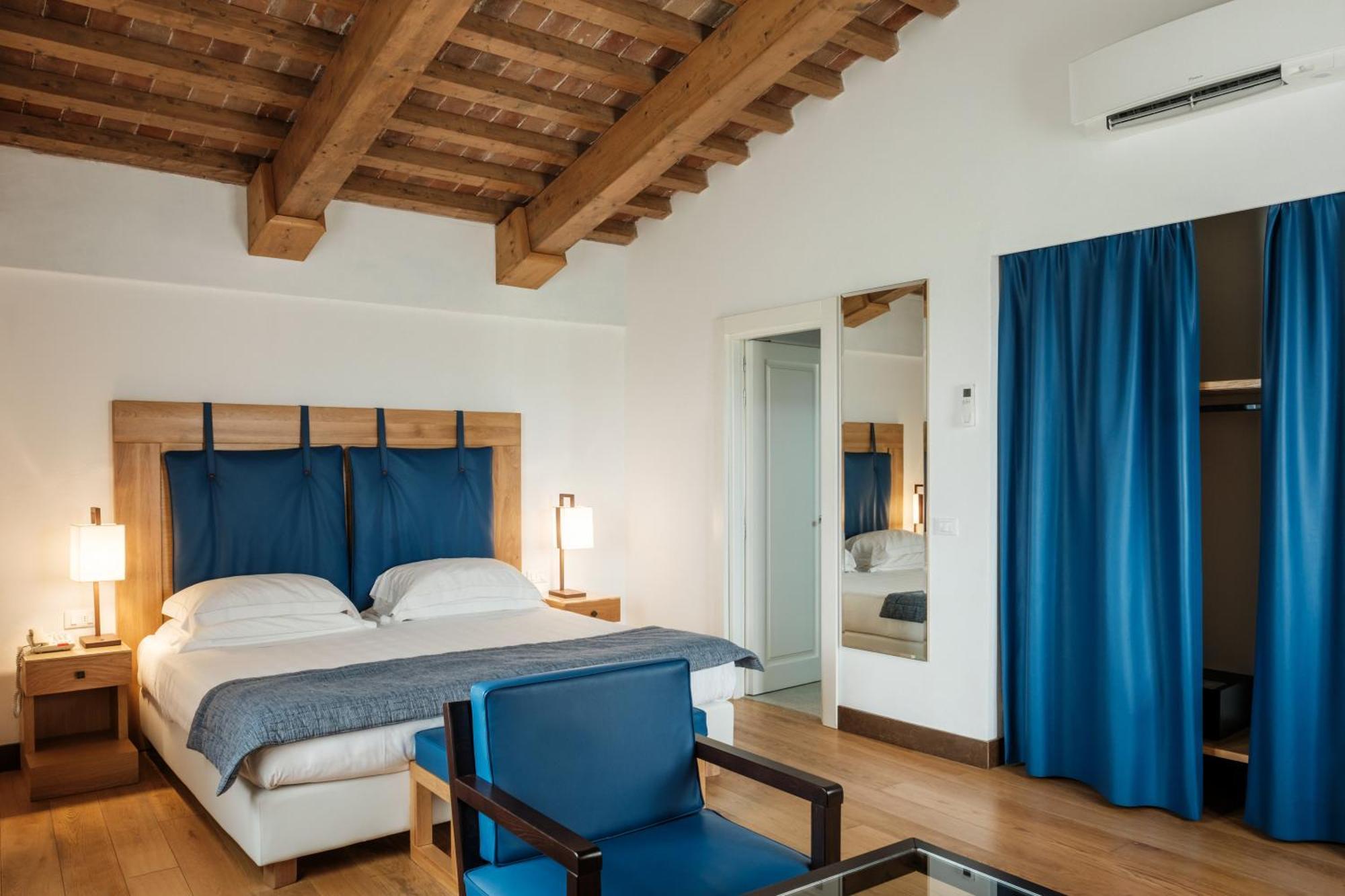 Villa Tolomei Hotel&Resort Firenze Esterno foto A room at the hotel