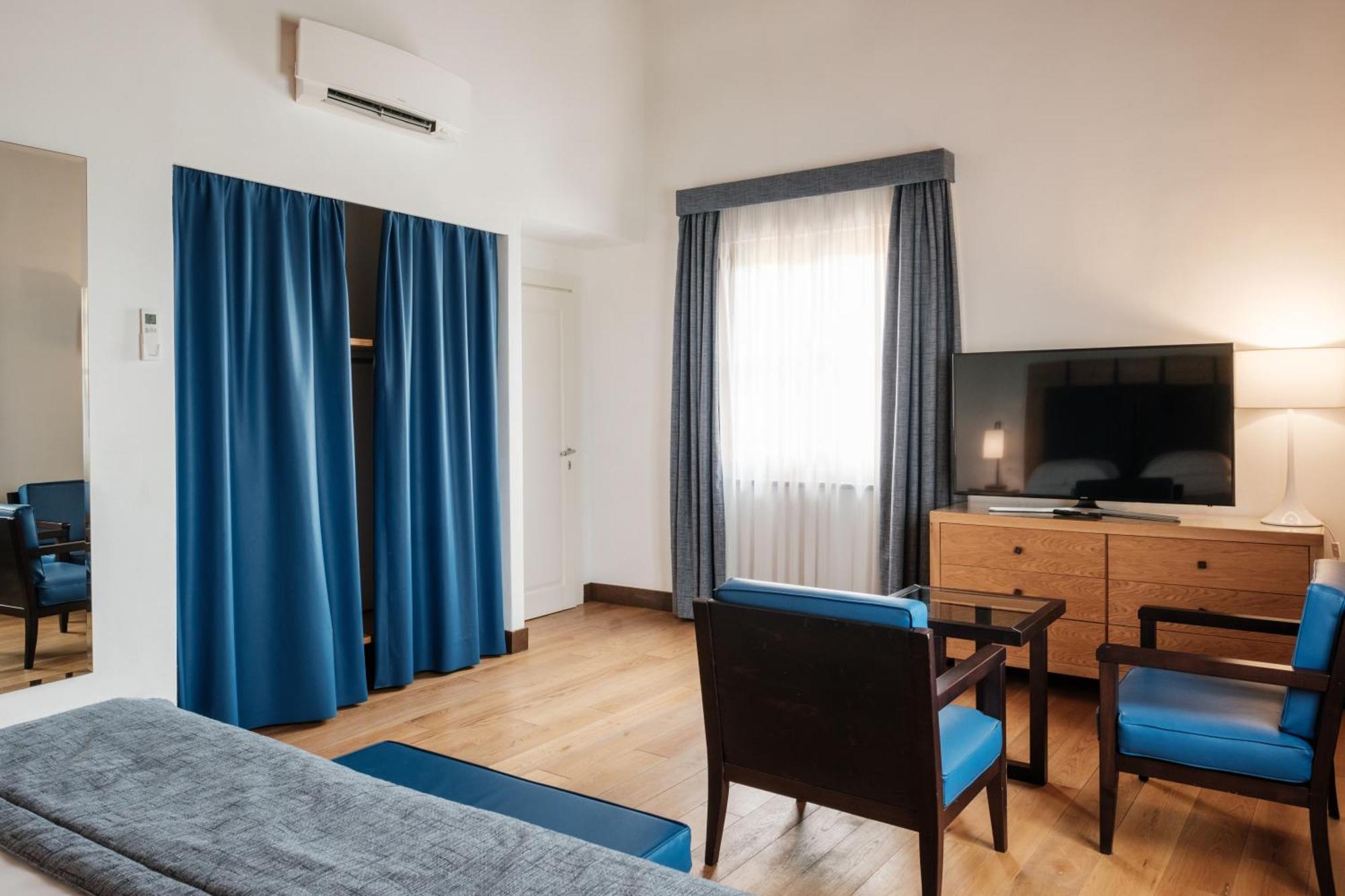 Villa Tolomei Hotel&Resort Firenze Esterno foto A room at the hotel