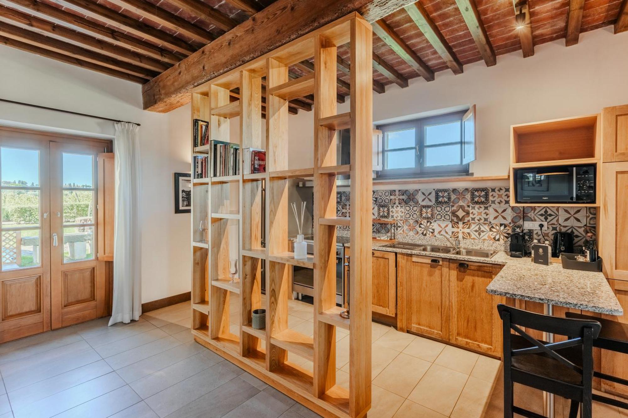 Villa Tolomei Hotel&Resort Firenze Esterno foto A room divider in a kitchen