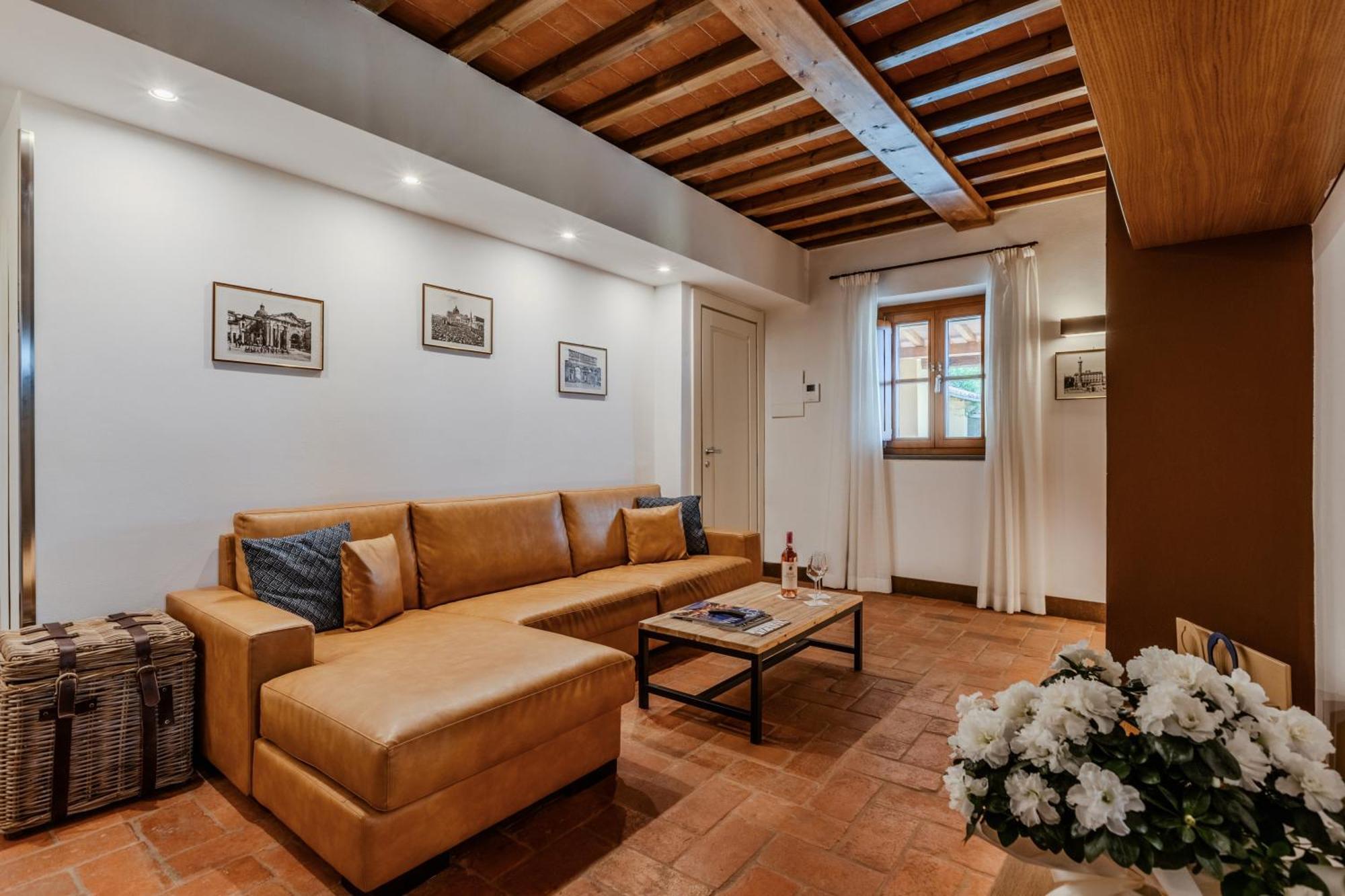 Villa Tolomei Hotel&Resort Firenze Esterno foto A living room in a house
