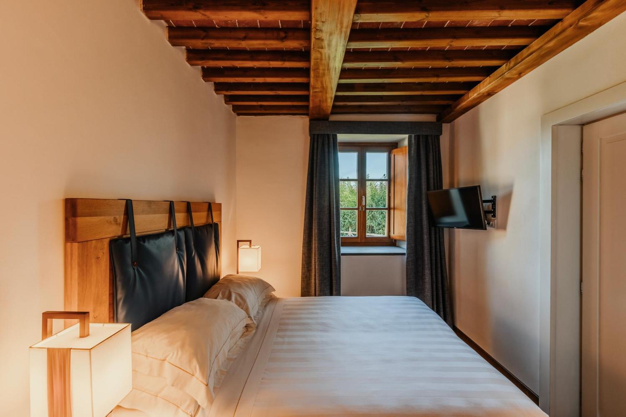 Villa Tolomei Hotel&Resort Firenze Esterno foto A room at the hotel