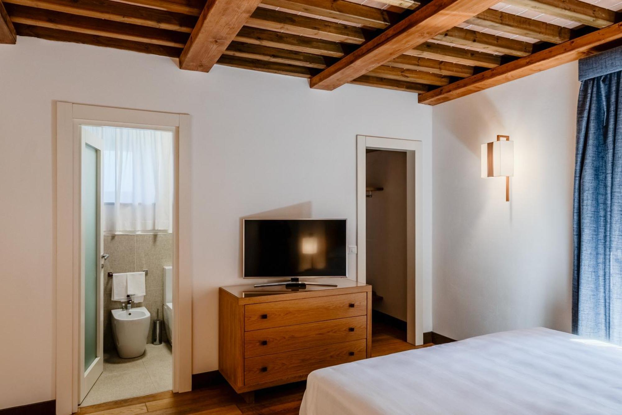 Villa Tolomei Hotel&Resort Firenze Esterno foto A room at the hotel